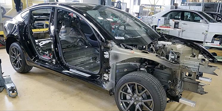 Tesla Model 3 у розібраному вигляді Tesla Model 3 у розібраному вигляді